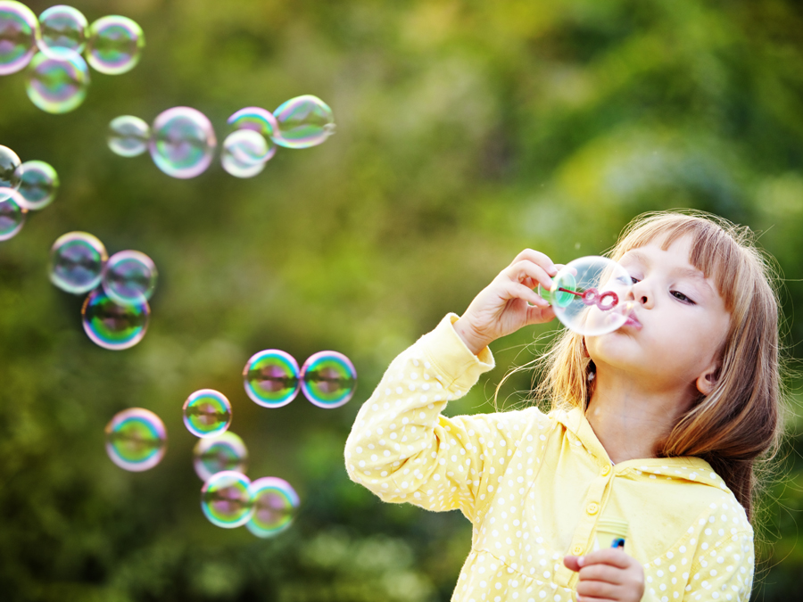 girl-blowing-bubbles-16677874790971835382614