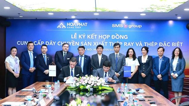 Tập đoàn Hòa Phát và Tập đoàn SMS group (Đức) ký hợp đồng cung cấp công nghệ và dây chuyền sản xuất thép ray và thép hình với công suất 700.000 tấn/năm 13