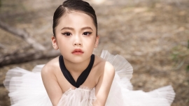 Vẻ đáng yêu của mẫu nhí 6 tuổi đa tài Nguyễn Nhật Ánh